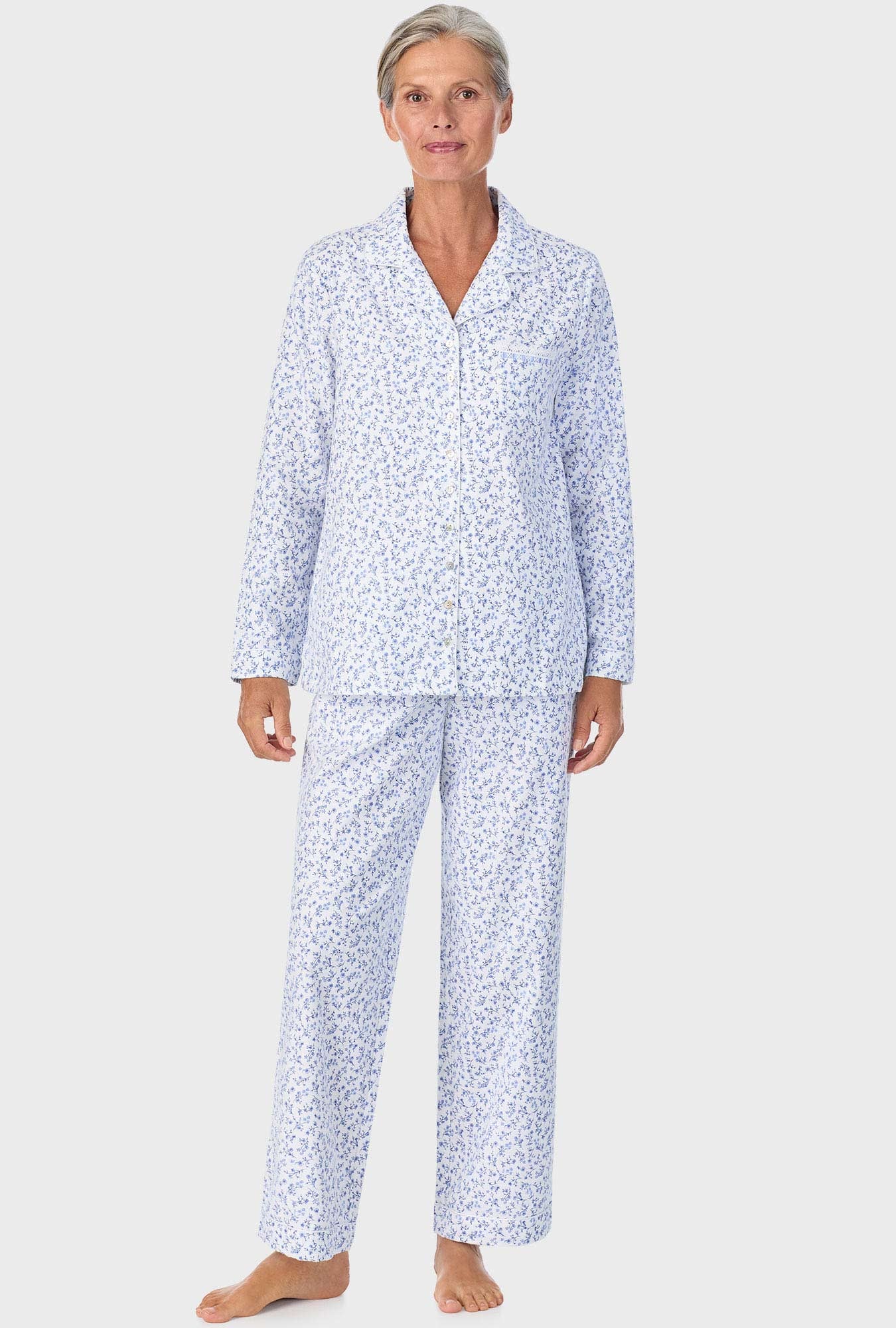 A lady wearing Serenity Blue Floral Notch Collar PJ Set