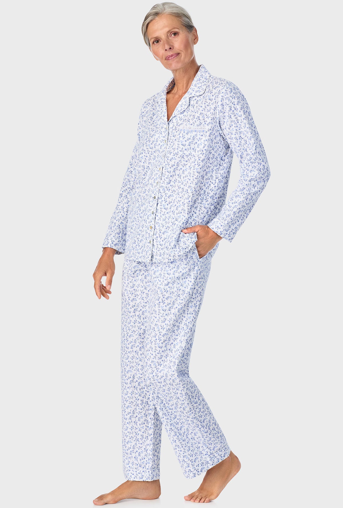 A lady wearing Serenity Blue Floral Notch Collar PJ Set