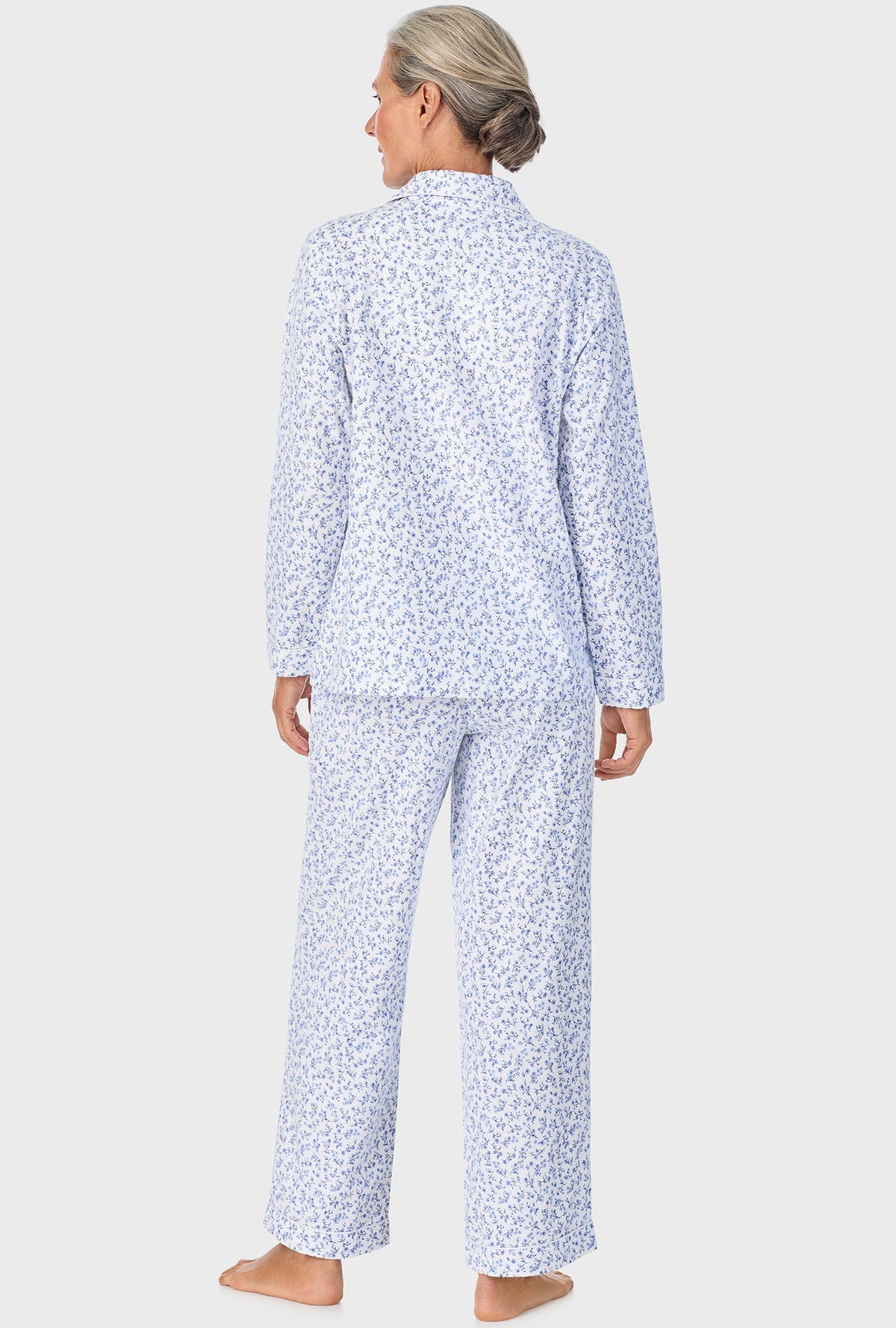 A lady wearing Serenity Blue Floral Notch Collar PJ Set