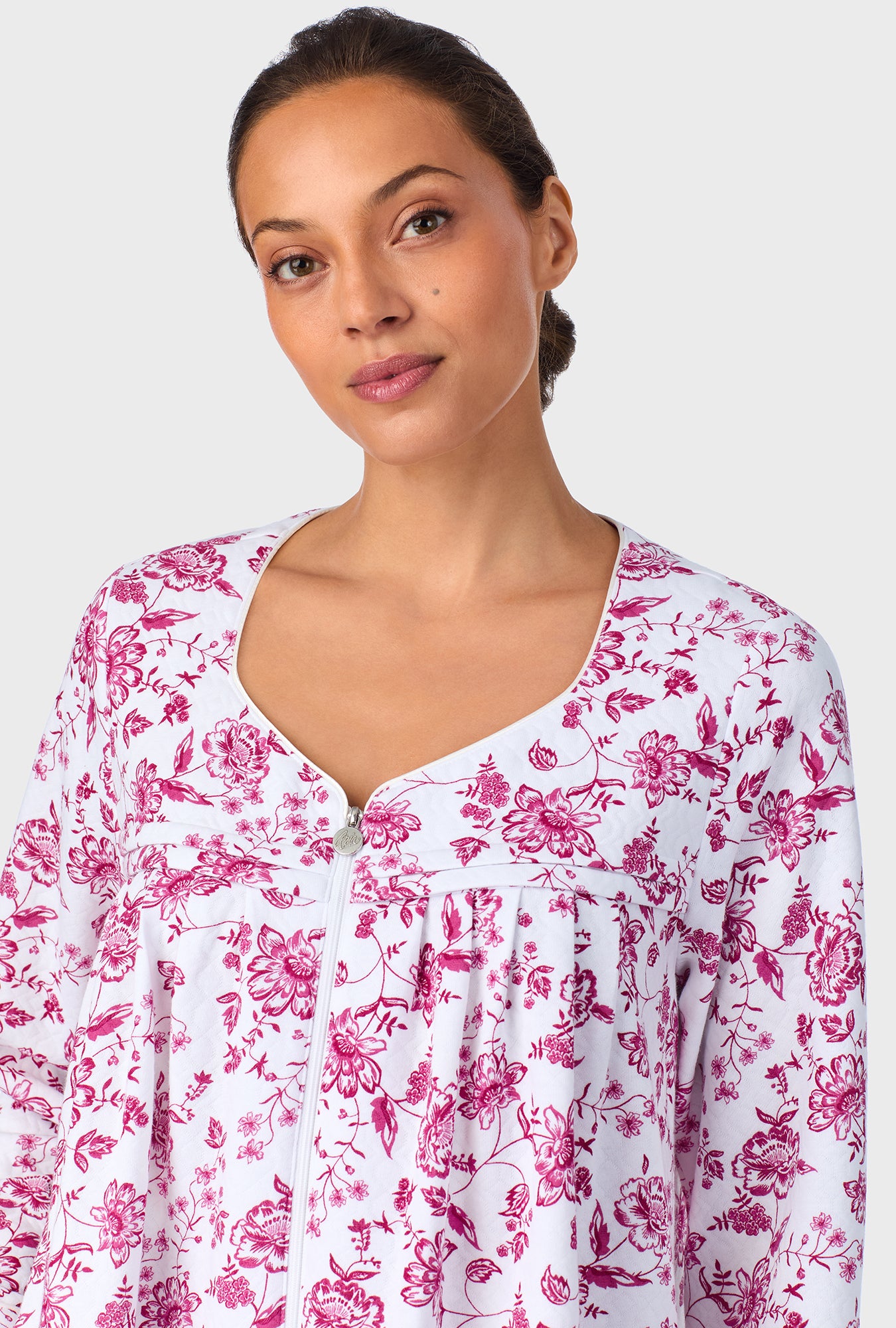 A lady wearing Crimson Floral Quilted Zip Duster
