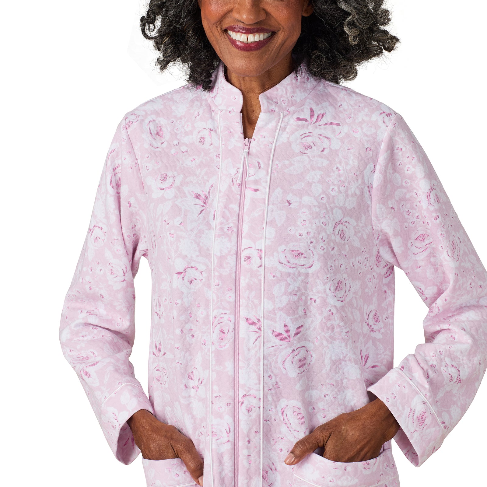A lady wearing Pink Roses Zip Robe