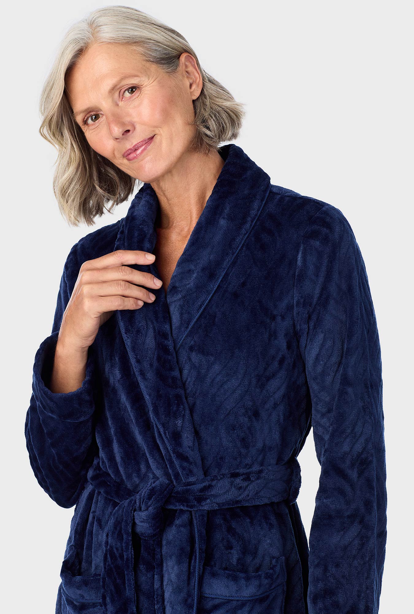 A lady wearing Navy  Chenille Wrap Robe