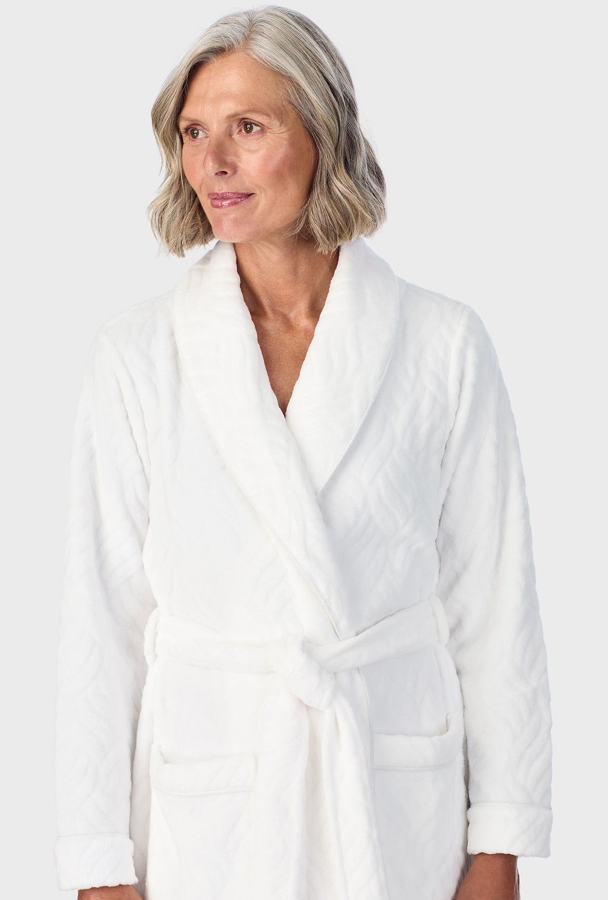 A lady wearing Ivory Chenille Wrap Robe