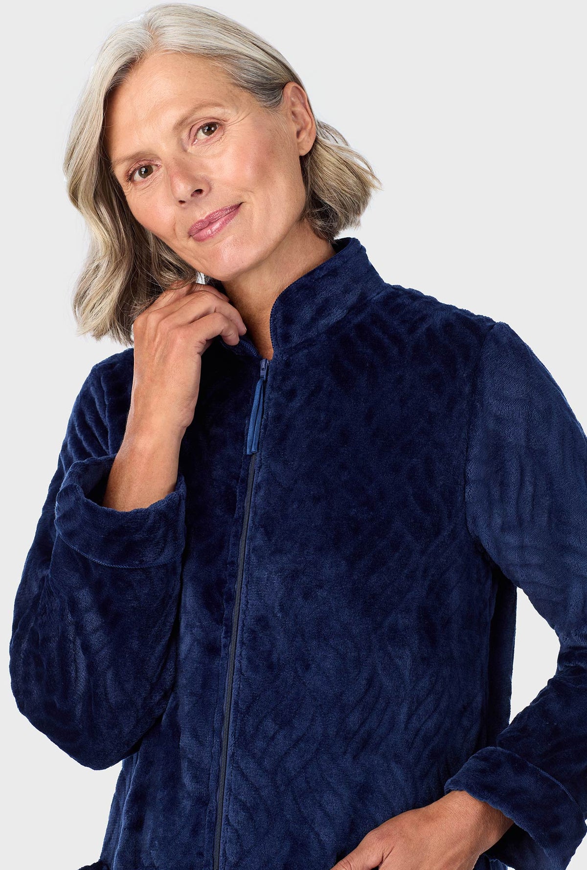 A lady wearing Navy  Chenille Zip Front Robe