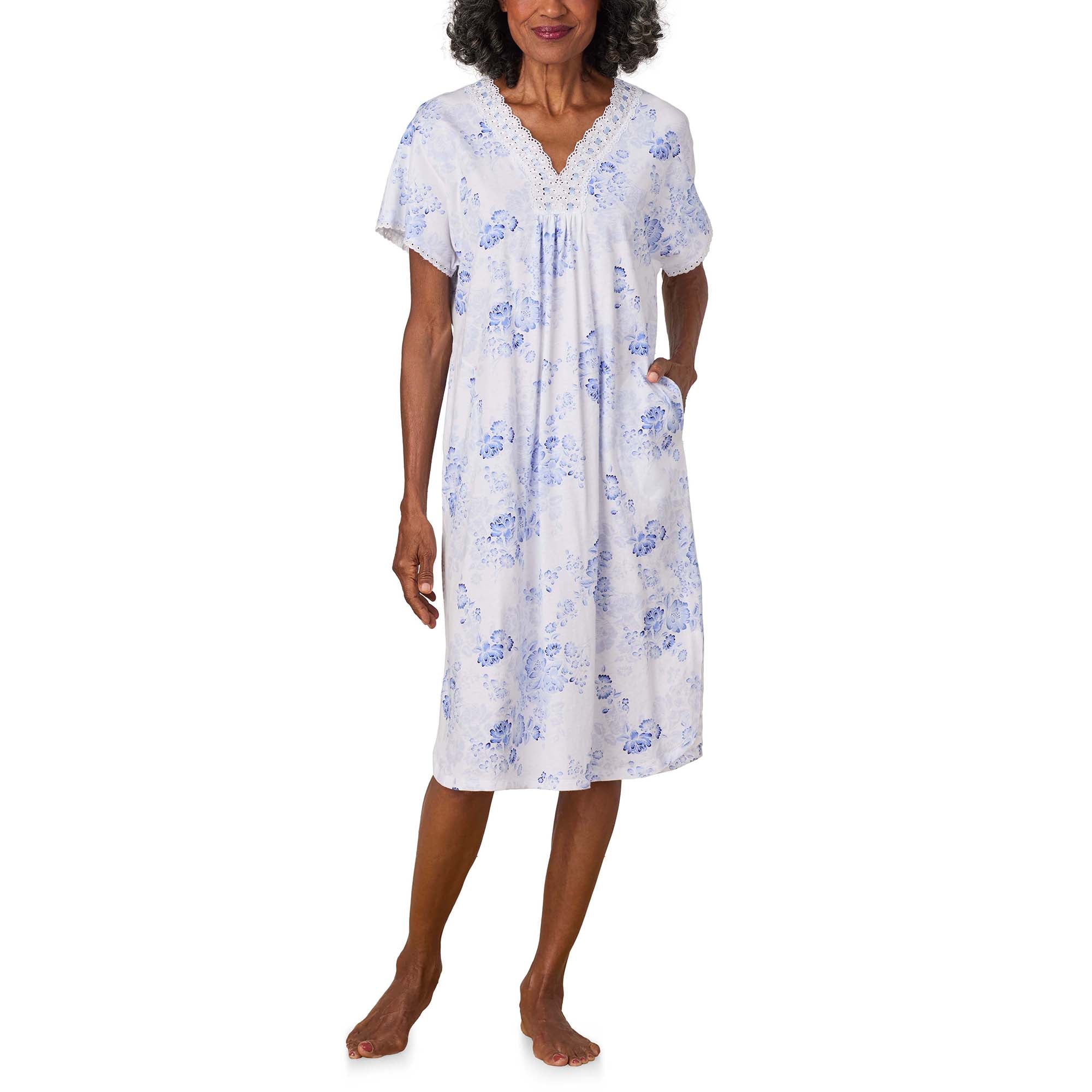 A lady wearing Blue Floral Cotton Jersey Kaftan