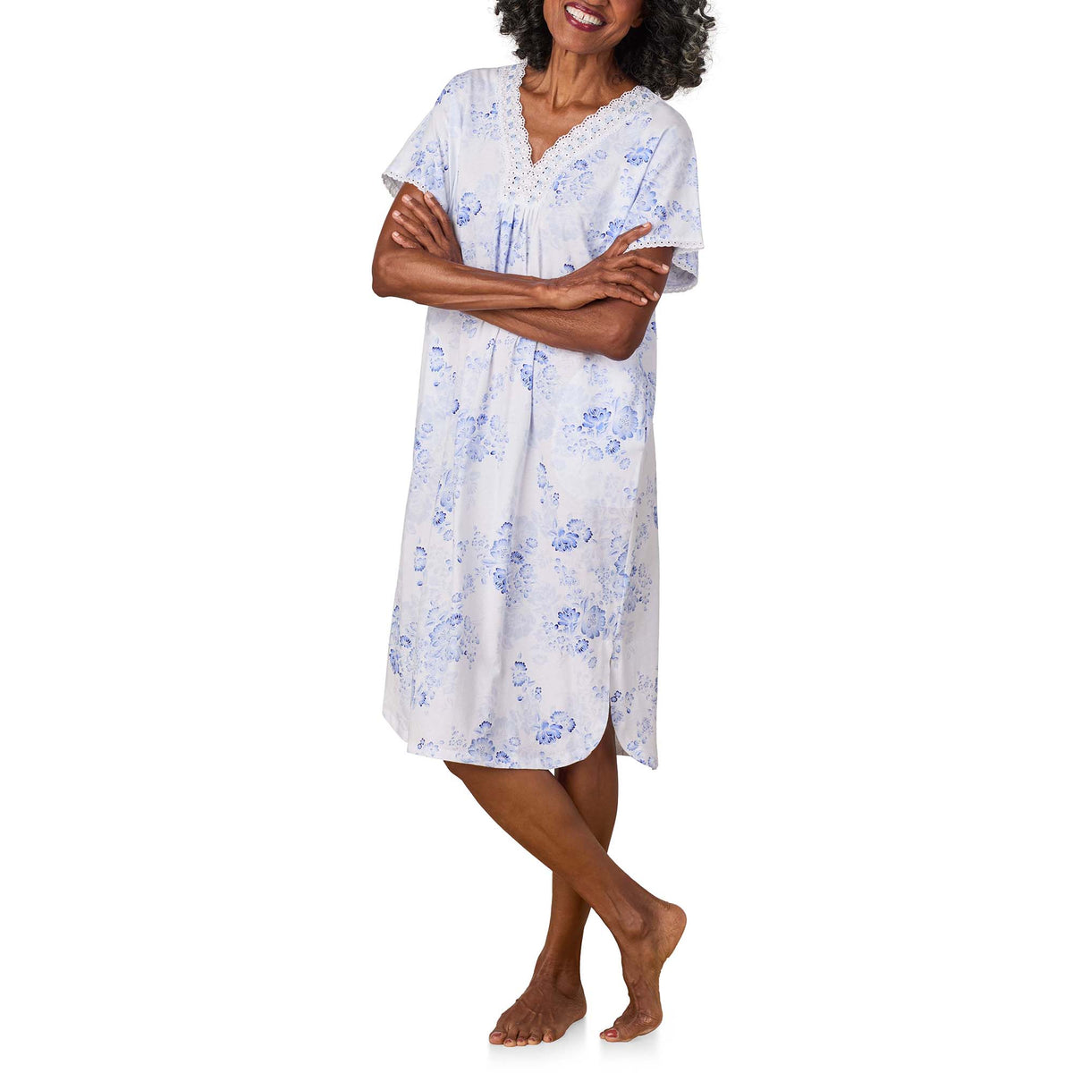 A lady wearing Blue Floral Cotton Jersey Kaftan